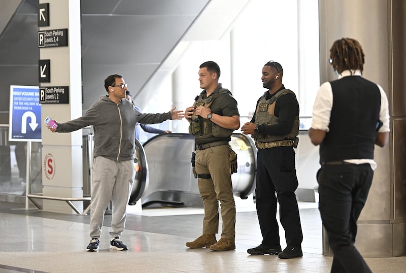 ATLANTA, UNITED STATES - MARCH 24: ICE agents stand at security checkpoints at Hartsfield-Jackson Atlanta International Airport as they assist operations during a partial government shutdown while TSA personnel work without pay, leading to long lines and delays in Atlanta, United States, on March 24, 2026. (Photo by Peter Zay/Anadolu via Getty Images)