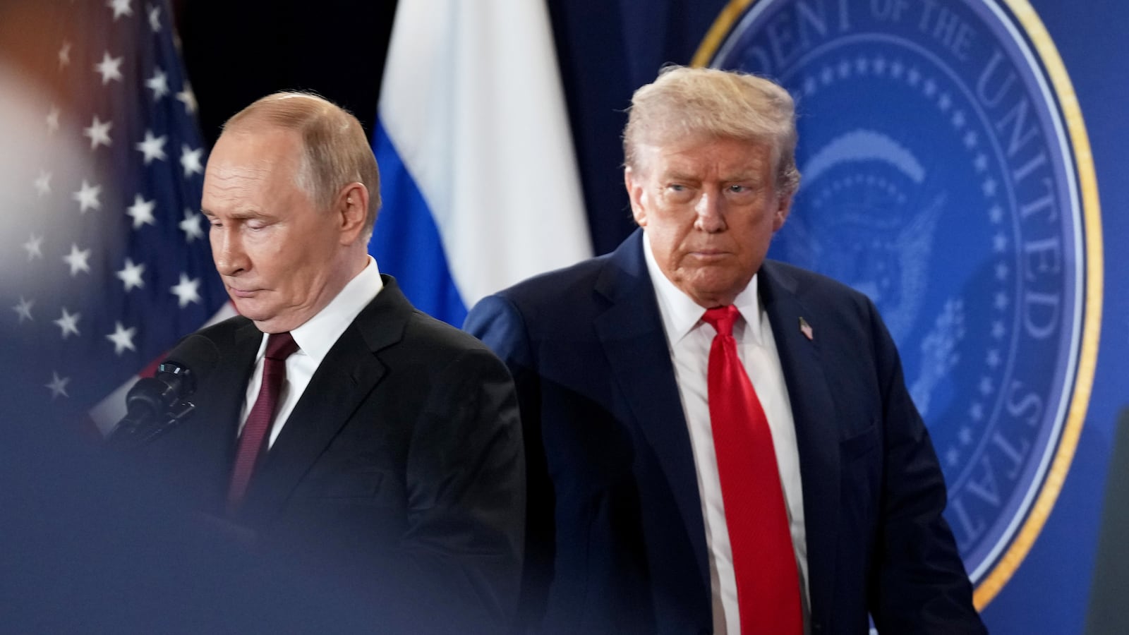 U.S. President Donald Trump (R) and Russian President Vladimir Putin arrive for a press conference at Joint Base Elmendorf-Richardson on August 15, 2025 in Anchorage, Alaska.
