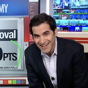 Harry Enten laughs sharing President Trump's polling numbers.