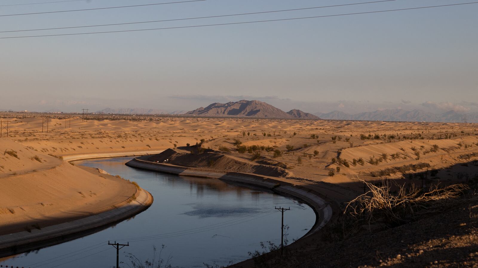 The All American Canal flows past the Imperial Sand Dunes near Felicity, California, U.S., December 5, 2022.