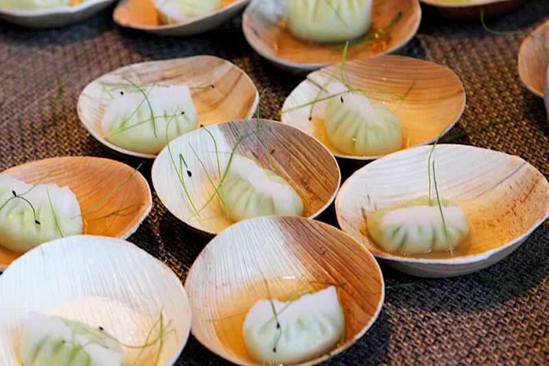 galleries/2012/04/29/the-2012-luckyrice-festival-celebrity-chefs-discuss-the-asian-food-craze-photos/asian-food-buddakan-edamame-dumpling-with-shallot-sautene-broth_m0zg9o