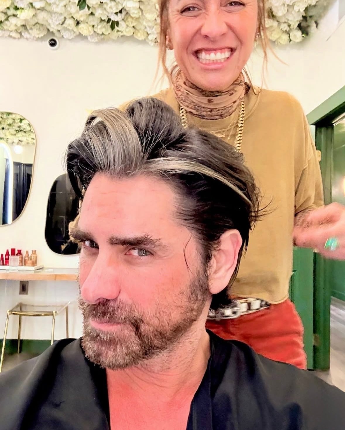 Stamos with hairstylist Riawna Capri.