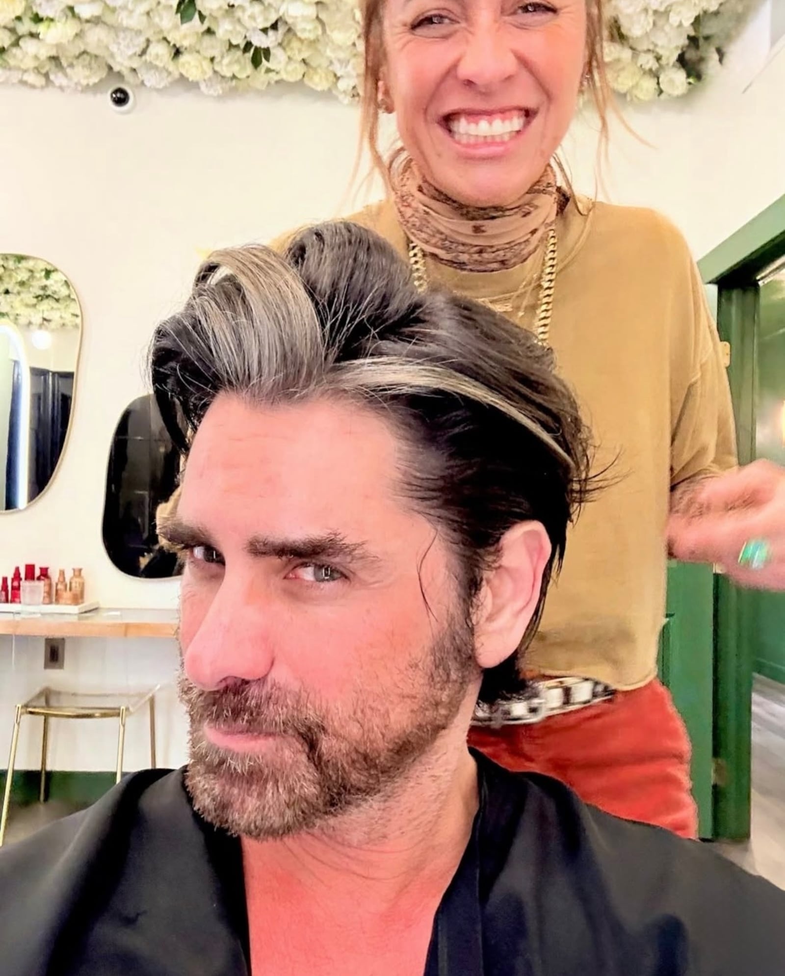 Stamos with hairstylist Riawna Capri.