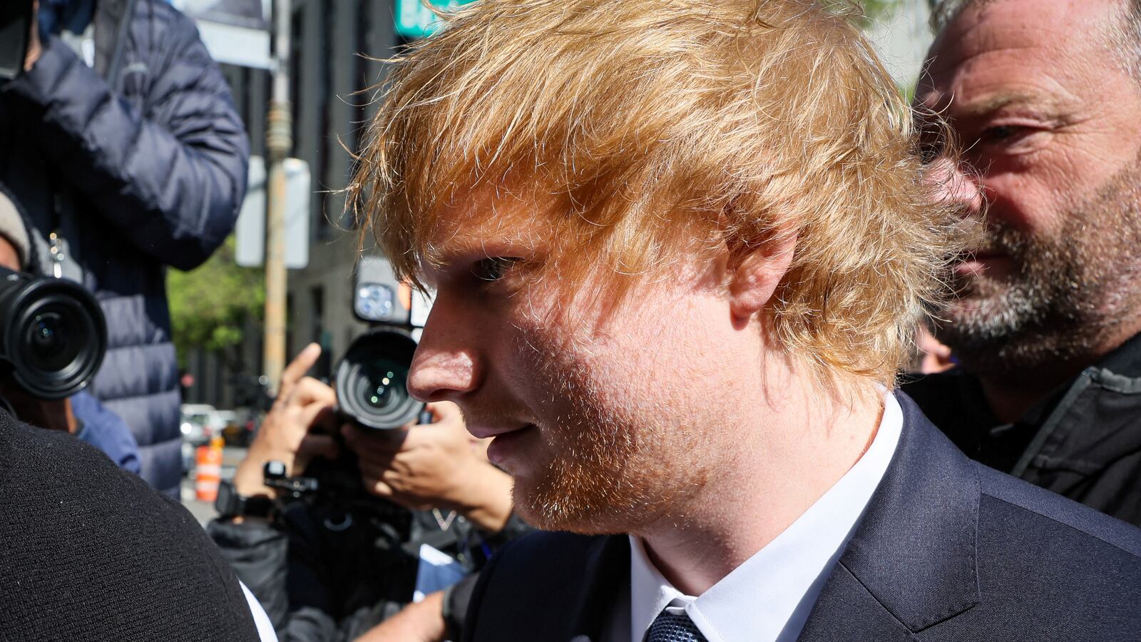 2023-04-25T144249Z_1741577342_RC2QL0A9W4SF_RTRMADP_3_COPYRIGHT-SHEERAN-THINKING_qjgijp