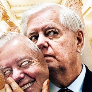 Lindsey Graham removing his mask.