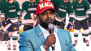 A photo illo illustration of Kash Patel, and the Woodrow Wilson High School hockey team that Patel coached from 2017-2019.