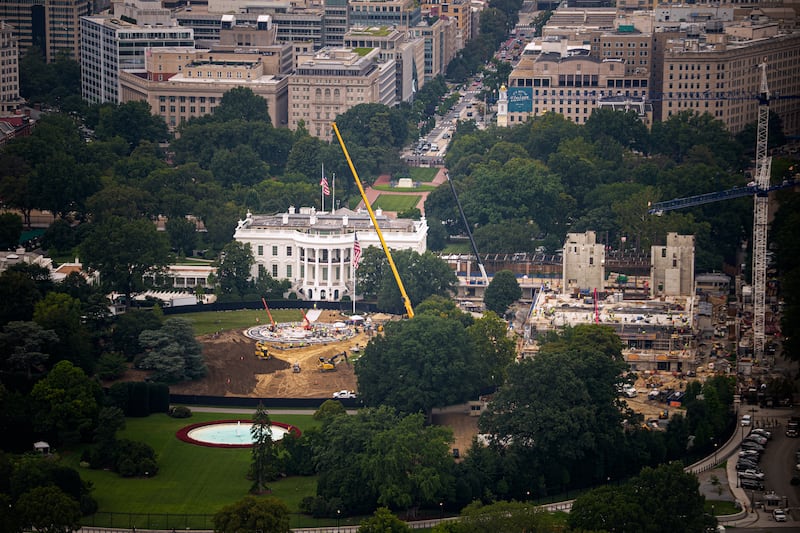 The Supreme Court has temporarily allowed work to continue on the ballroom (right).
