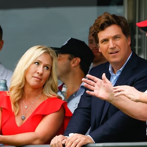 BEDMINSTER, NJ - JULY 31: Former President Donald Trump, Tucker Carlson and Marjorie Taylor Greene during the 3rd round of the LIV Golf Invitational Series Bedminster on July 31, 2022 at Trump National Golf Club in Bedminster, New Jersey. (Photo by Rich Graessle/Icon Sportswire via Getty Images)