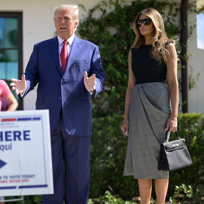 Former President Donald Trump addresses reporters after he and former First Lady Melania Trump voted.