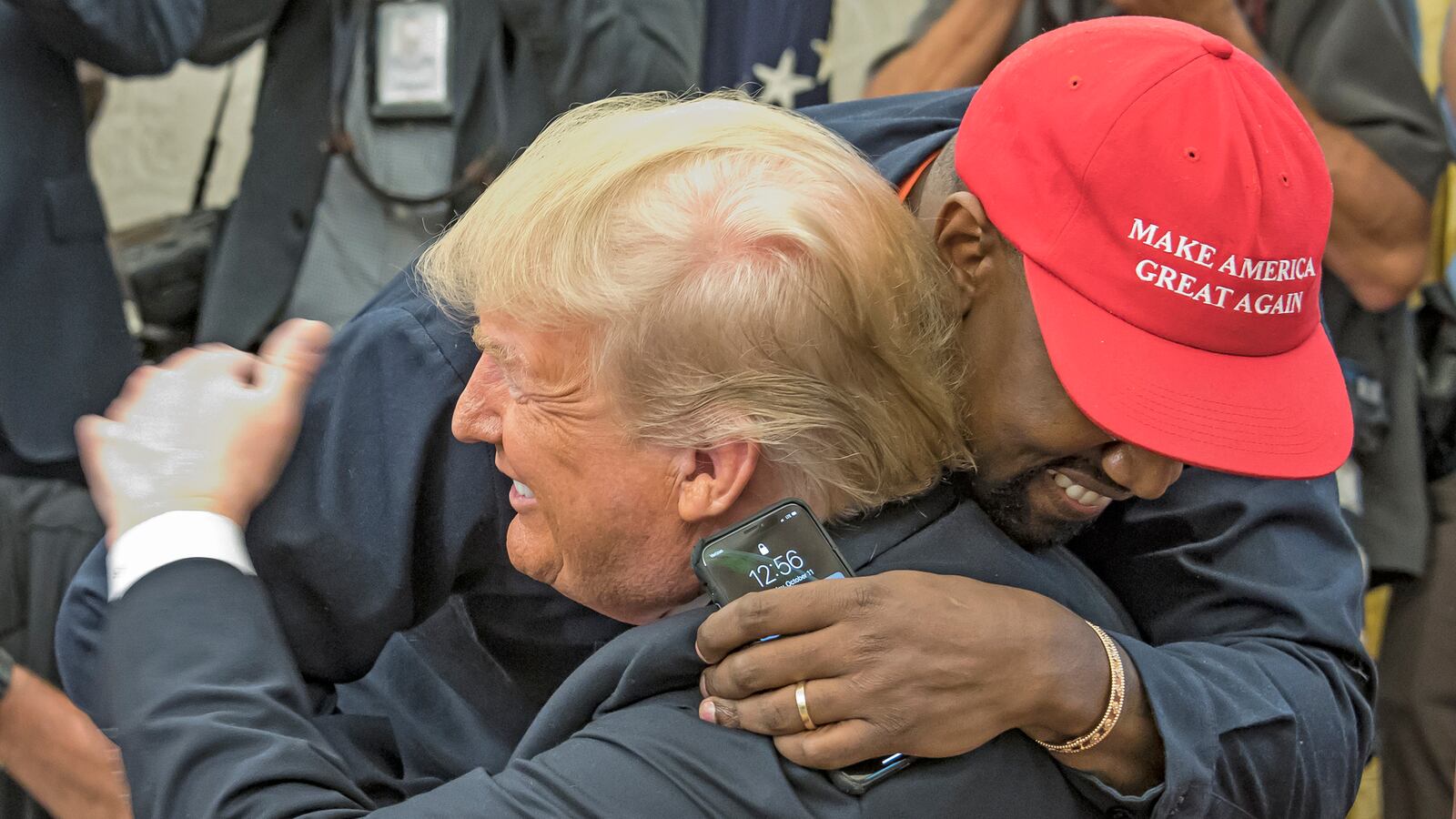 Kanye West embraces real estate developer and US President Donald Trump