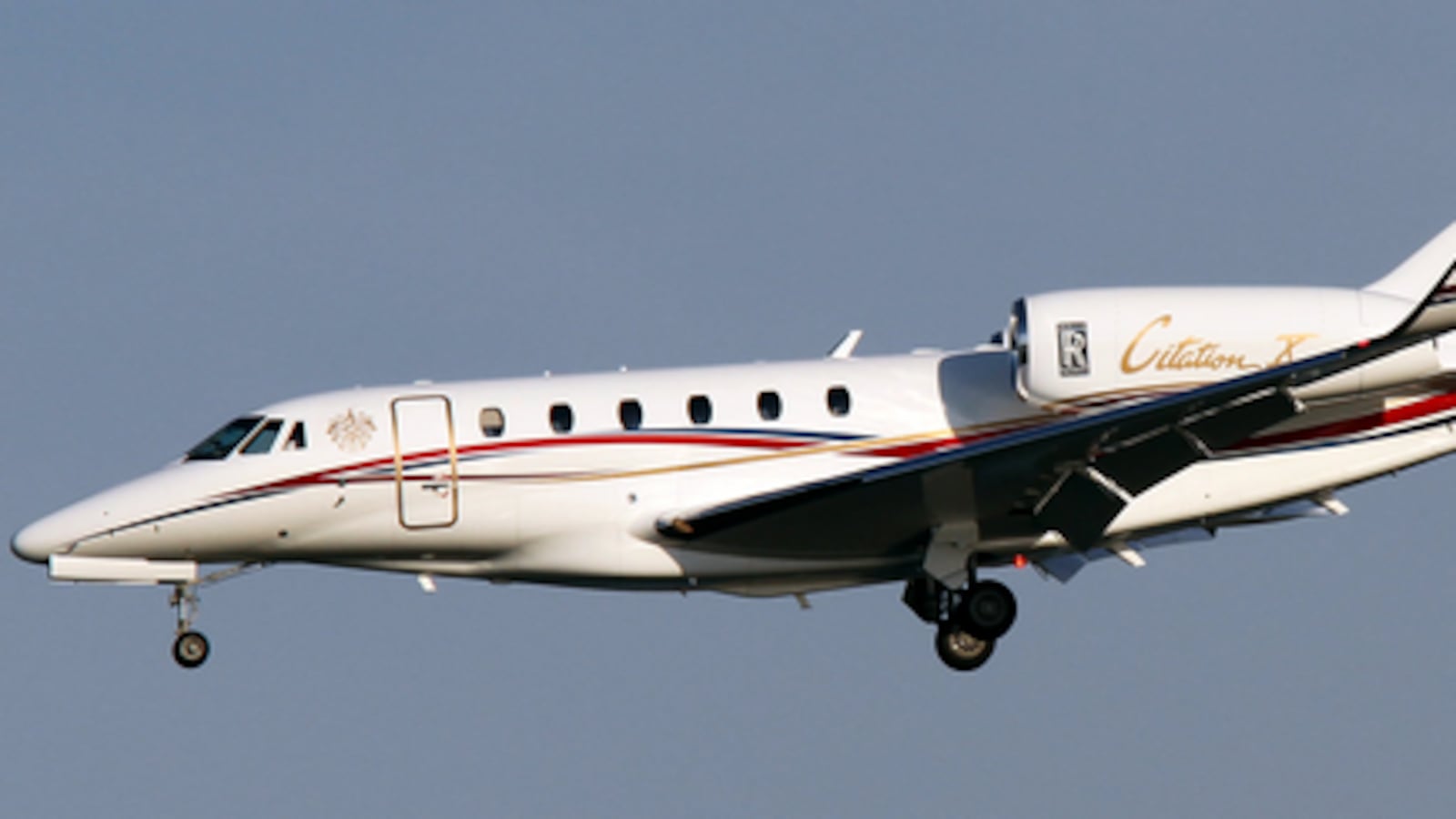 A photo of Donald Trump's jet in the sky.