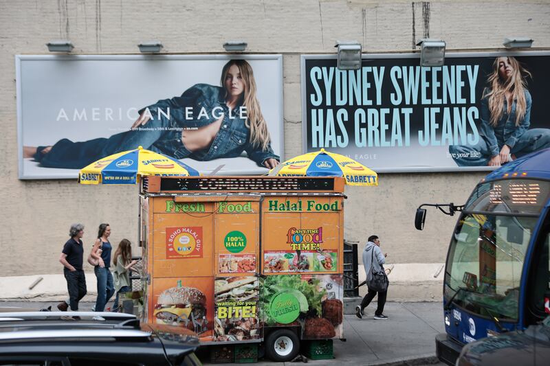 NEW YORK, NEW YORK - AUGUST 01: Billboards of actress Sydney Sweeney is seen outside of an American Eagle store on August 01, 2025 in New York City. American Eagle’s recent denim ad campaign featuring  Sweeney has drawn backlash for language and imagery that critics say echoes eugenics-era rhetoric, following a tagline referencing “great genes” alongside visuals of Sweeney in blue jeans. (Photo by Michael M. Santiago/Getty Images)