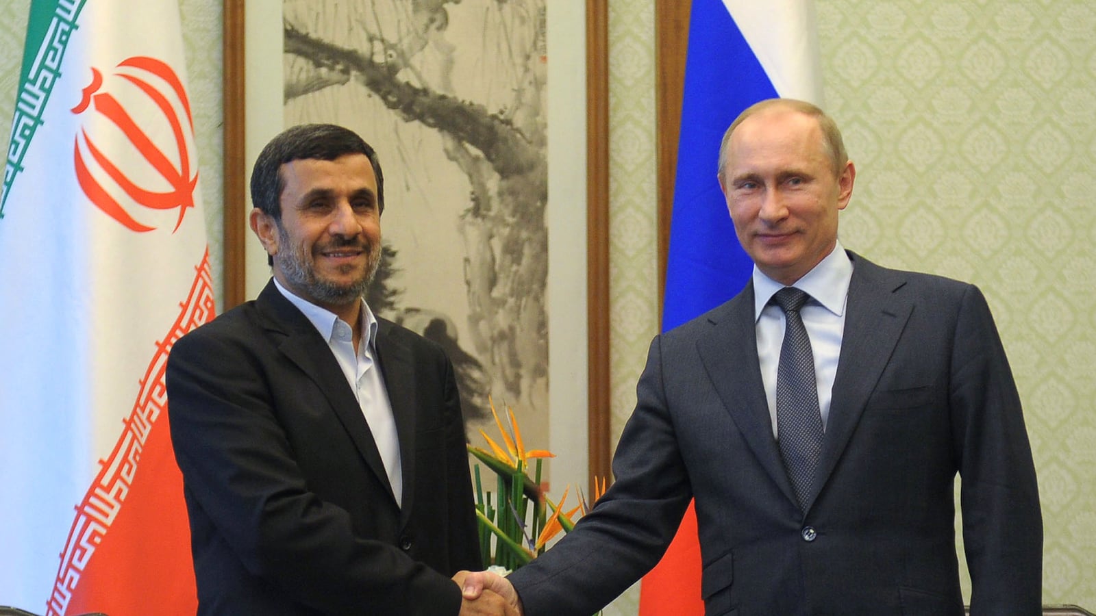 articles/2012/07/02/announcing-the-axis-of-authoritarians/putin_ahmadinejad_ng7zdn
