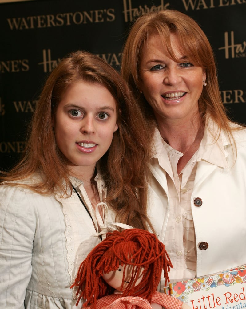 Princess Beatrice and Sarah Ferguson during Sarah Ferguson In-store Signing of Her Children's Book "Little Red's Summer Adventure" at Harrods in London - July 1, 2006 at Harrods in London, Great Britain. (Photo by Ferdaus Shamim/WireImage)