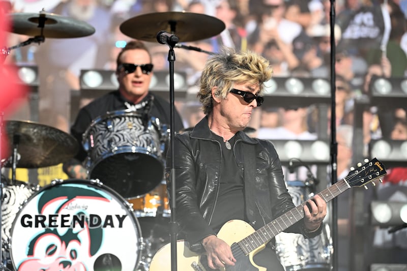 US musician Billie Joe Armstrong, of the rock band Green Day, performs during the opening ceremony ahead of Super Bowl LX between the New England Patriots and Seattle Seahawks at Levi's Stadium in Santa Clara, California on February 8, 2026. (Photo by JOSH EDELSON / AFP via Getty Images)
