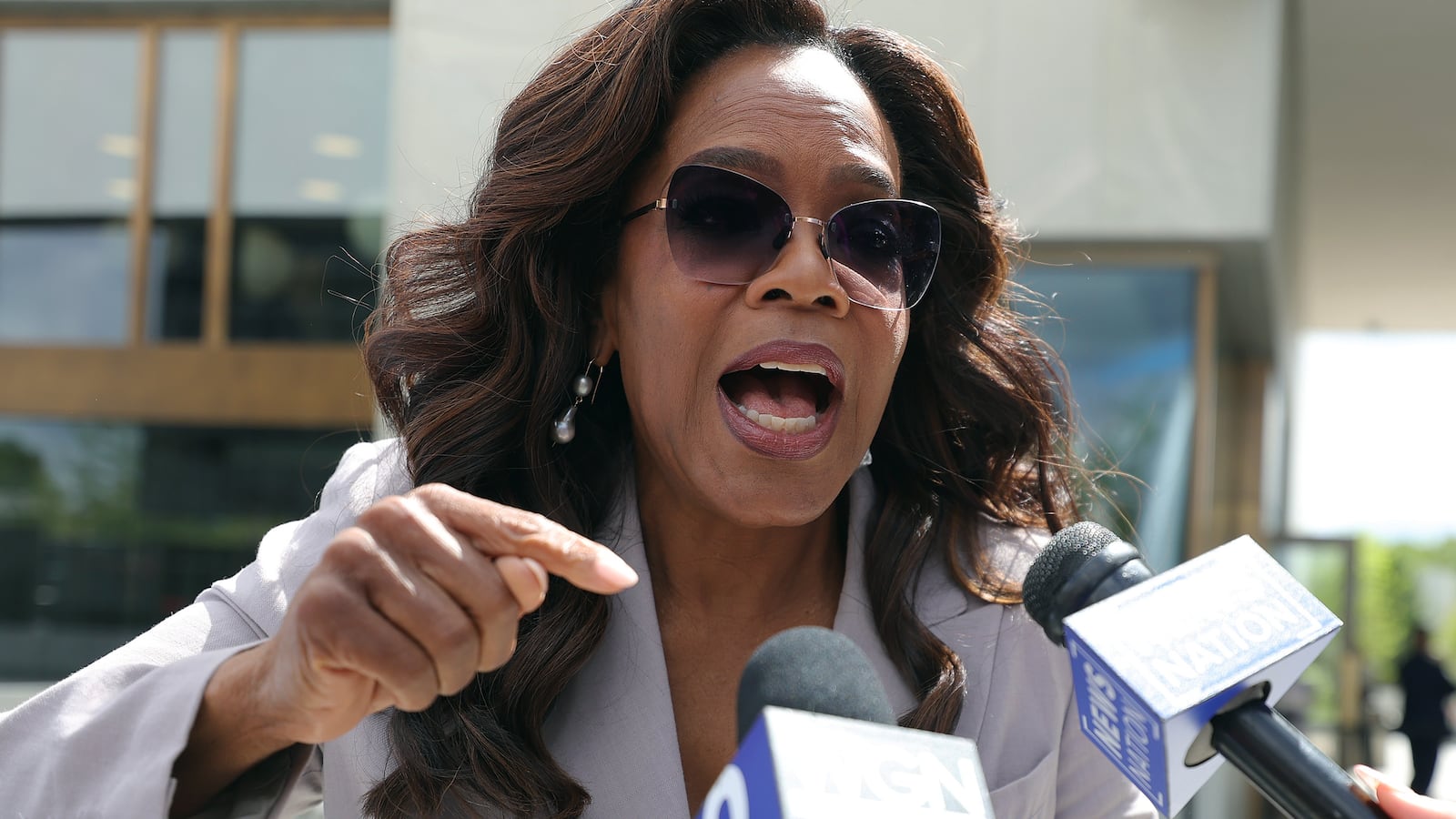 Oprah Winfrey gives an interview as she attends the dedication ceremony for the opening of the Barack Obama Presidential Center in John Lewis Plaza on June 18, 2026 in Chicago, Illinois.