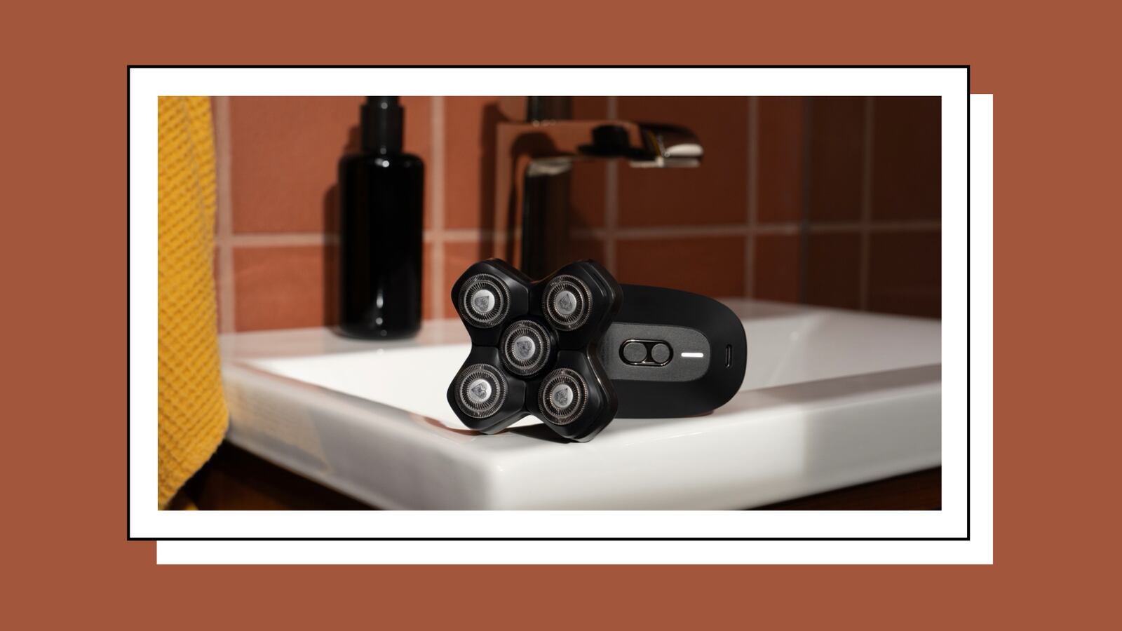 MANSCAPED® Dome Shaver on a sink