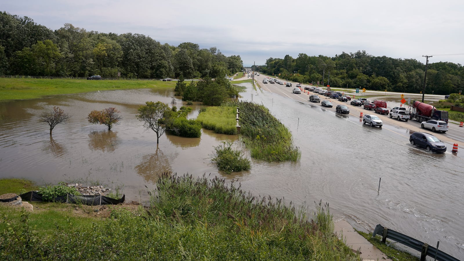 A view of a road flooded after heavy rains in Detroit, Michigan. At least five people—including two children—have died as severe thunderstorms have wreaked havoc in Michigan.