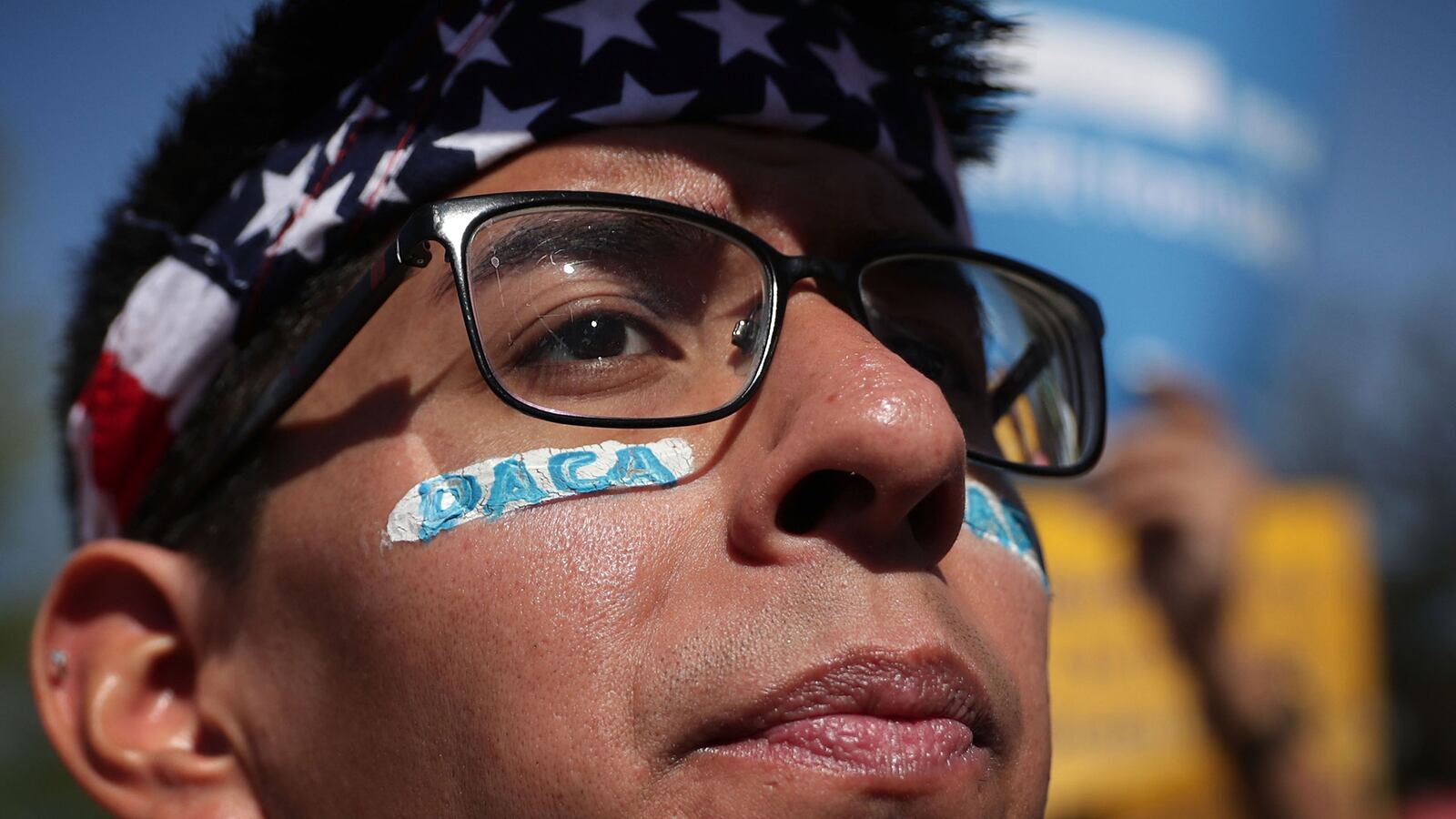 Pro-immigration activist Omar Martinez attends a rally in front of the U.S. Supreme Court April 18, 2016 in Washington, DC.