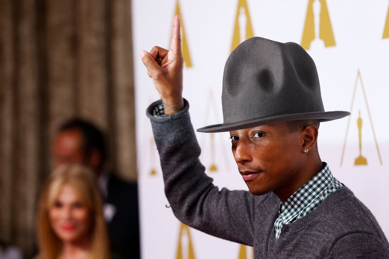 articles/2014/02/21/pharrell-williams-grammys-hat-for-sale-lena-dunham-responds-to-altered-vogue-photos/140221-pharrell-hat-fashion-cheat_fy7nfr