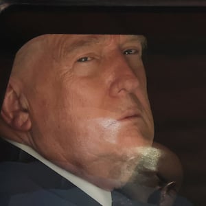 U.S. President Donald Trump looks out from a vehicle as he arrives at the Hotel Royal to attend the G7 Summit in Evian-les-Bains, France, June 15, 2026. REUTERS/Christian Hartmann/Pool
