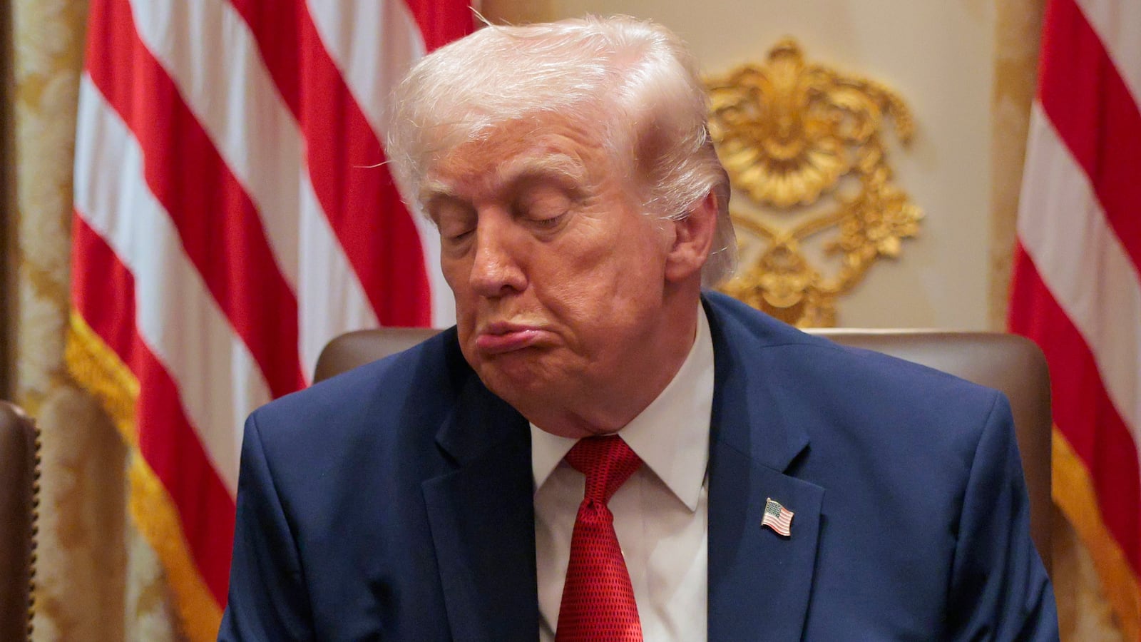 WASHINGTON, DC - MARCH 26: U.S. President Donald Trump reacts as U.S. Secretary of State Marco Rubio (L) looks on during a Cabinet meeting in the Cabinet Room of the White House on March 26, 2026 in Washington, DC. This is Trump's second Cabinet meeting of 2026 and the first since the United States and Israel began attacking Iran on February 28. (Photo by Chip Somodevilla/Getty Images)