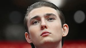 US President Donald Trump' son Barron Trump looks on during the inaugural parade inside Capital One Arena, in Washington, DC, on January 20, 2025. (Photo by Jim WATSON / AFP)