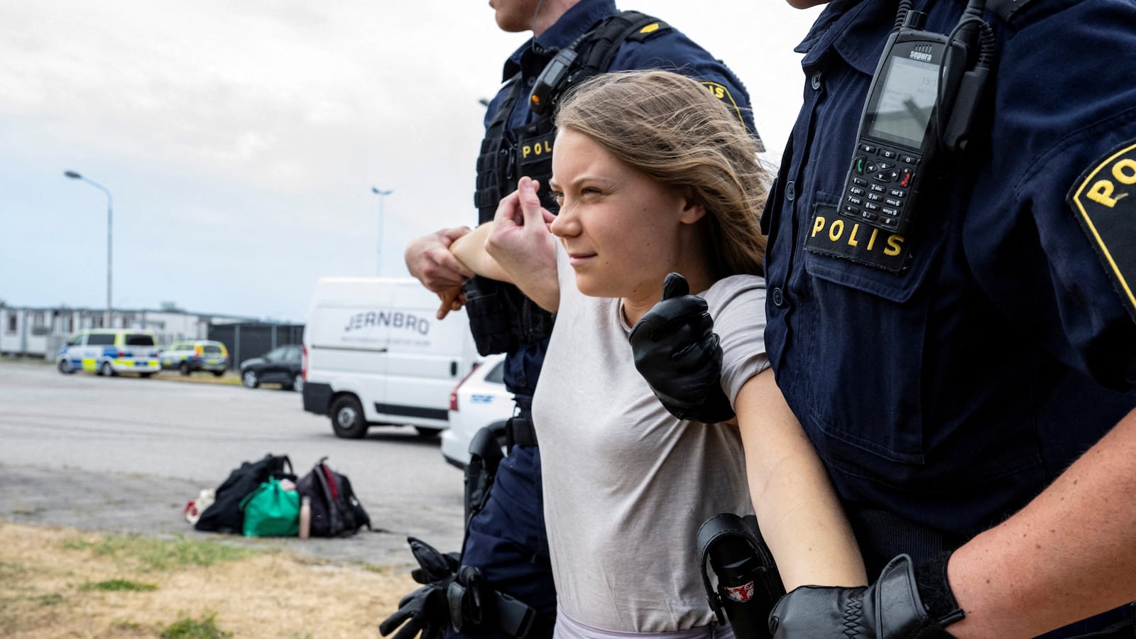 Police remove Greta Thunberg as they move climate activists from the organization Ta Tillbaka Framtiden, who are blocking the entrance to Oljehamnen in Malmo, Sweden, June 19, 2023.