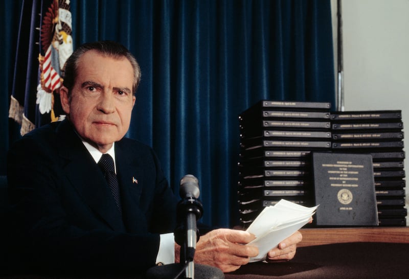 President Richard Nixon said he will turn over 1,200 pages of edited transcripts about Watergate scandal to the House Judiciary Committee that, he said, would clear him of any involvement and will "tell it all". The stack of transcripts to be turned over are in the background.