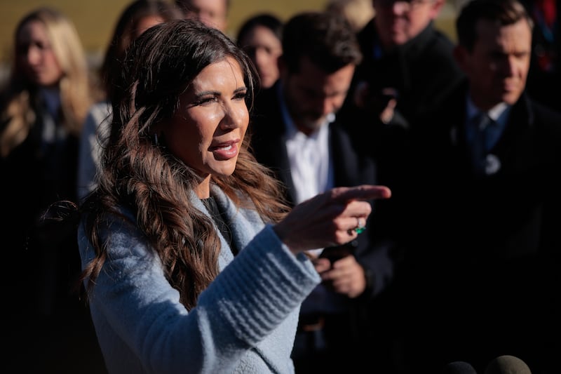 Secretary of Homeland Security Kristi Noem talks to reporters outside the White House on January 15, 2026. She also was at the White House on Monday to meet with Trump amid backlash over the ICE killing of Alex Pretti.