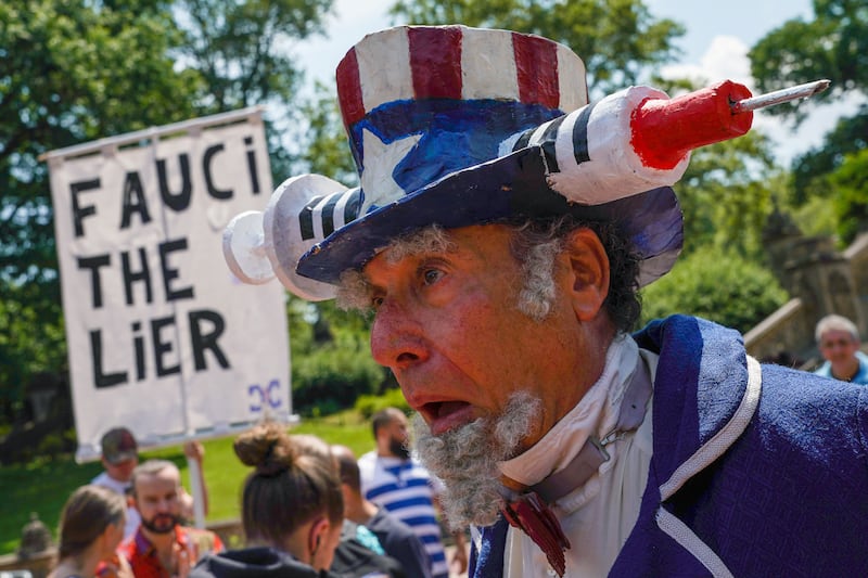 A man reacts during an anti-vaccine demonstration, amid the coronavirus disease (COVID-19) pandemic, in Central Park, New York City, U.S., July 24, 2021.  REUTERS/David 'Dee' Delgado