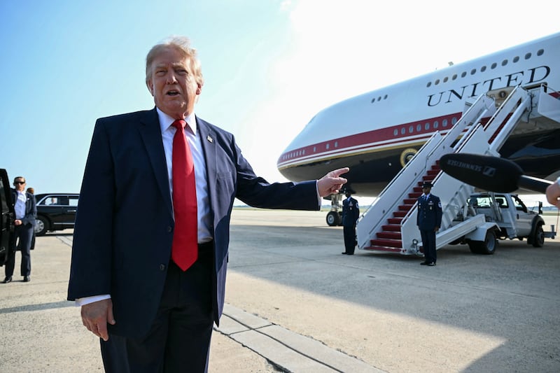 US President Donald Trump speaks to the press before he boards Air Force One for his first flight aboard the Boeing 747-8 that Qatar gifted the United States to use for executive travel, at Joint Base Andrews, in Maryland, July 1, 2026. President Trump is traveling to Medora, North Dakota to participate in the Theodore Roosevelt Presidential Library Opening Ceremony. (Photo by SAUL LOEB / AFP via Getty Images)