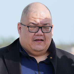White House communications director Steven Cheung talks to reporters after arriving with Vice President JD Vance from Islamad, Pakistan, on Air Force Two, at Joint Base Andrews, Maryland, on April 12, 2026.