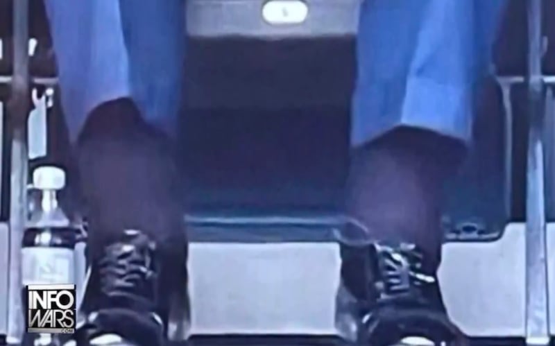 The Alex Jones Podcast shows a shot of Trump's ankles.