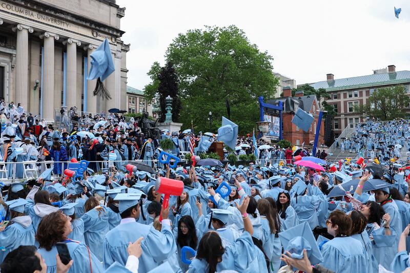 Columbia students at graduation ceremony.