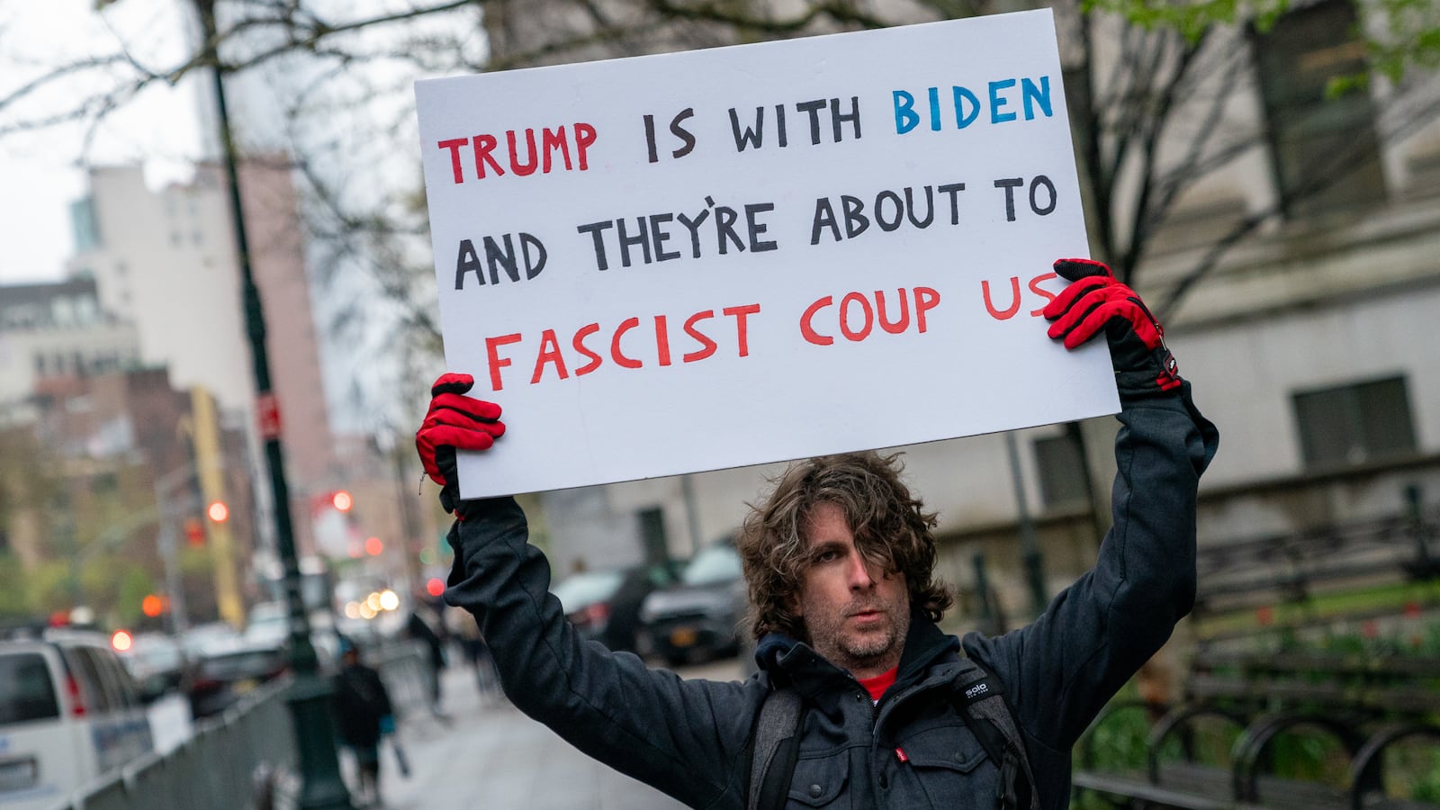 Max Azzarello protests outside of the Manhattan courthouse where former U.S. President Donald Trump's hush money trial is taking place