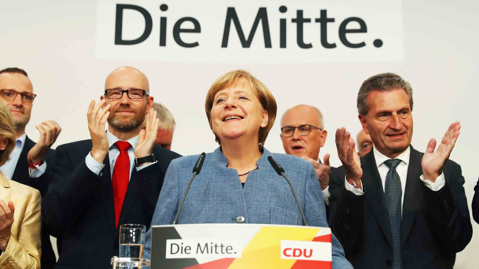 170924-merkel-tease_qfhjzx