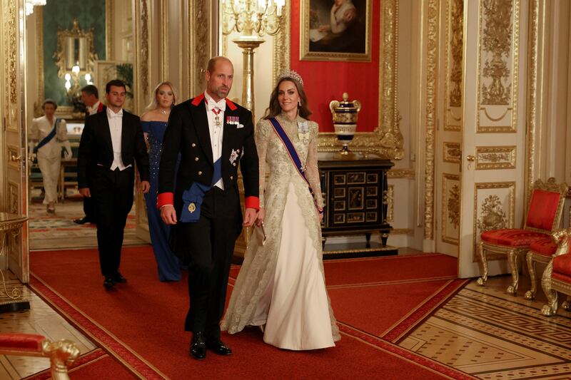 Britain's William, Prince of Wales and Catherine, Princess of Wales walk to attend the State Banquet during U.S. President Donald Trump's state visit, at Windsor Castle, in Windsor, Britain, September 17, 2025. REUTERS/Phil Noble/Pool