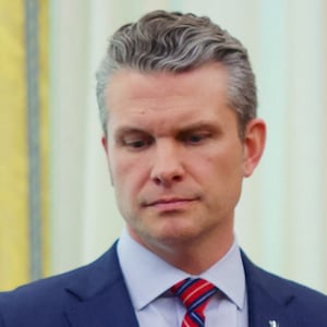 U.S. President Donald Trump delivers remarks with Defense Secretary Pete Hegseth in the Oval Office at the White House, in Washington, D.C., U.S., March 21, 2025.