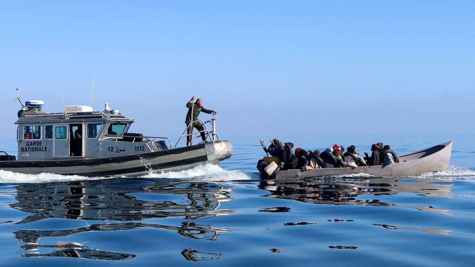 Eleven people are missing as Tunisian migrant boat sinks.