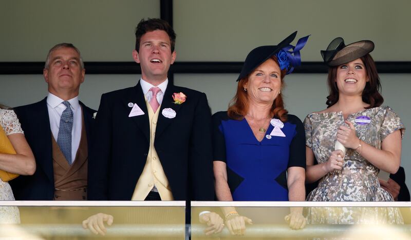 Prince Andrew, Duke of York; Jack Brooksbank, Sarah Ferguson, Duchess of York and Princess Eugenie watch the racing as they attend day 4 of Royal Ascot at Ascot Racecourse.