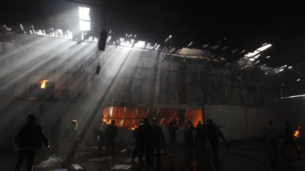 articles/2012/11/17/still-not-rebuilt-from-last-time/gaza-firefighter-openz_dlleqi