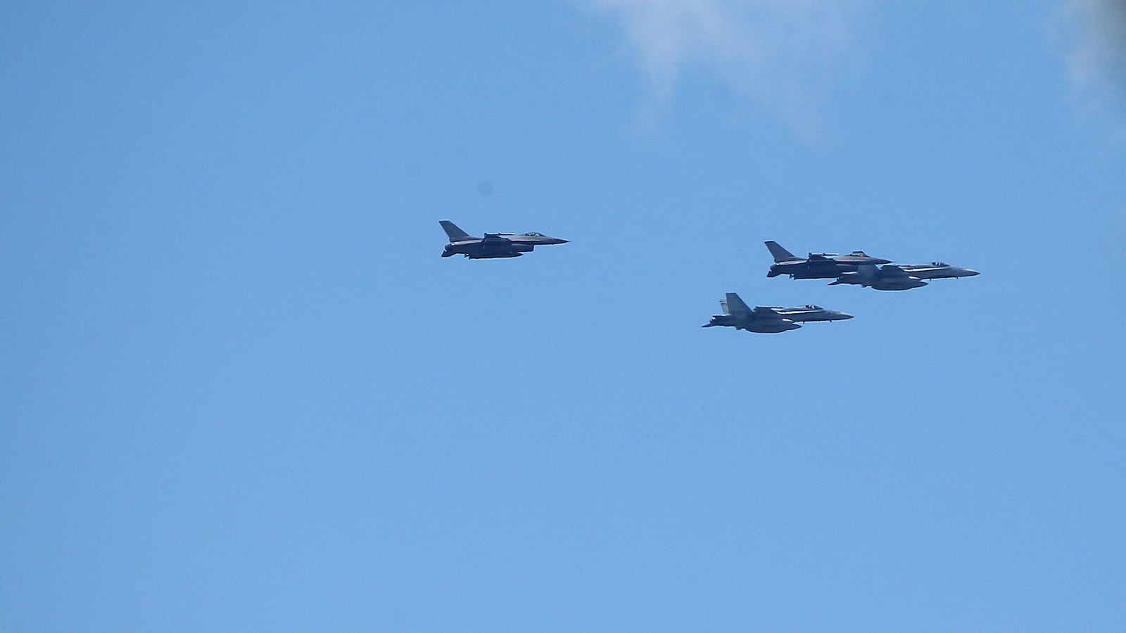 War planes fly over Lake Ontario as NORAD conducts training as Toronto will move into phase three of reopening with other parts of Ontario later in the week as the province tries to slow the spread of COVID-19 in Toronto. July 30, 2020.
