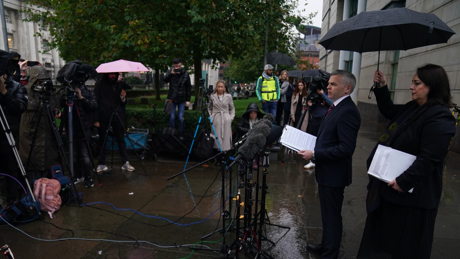 Detective Chief Superintendent Eamonn Corrigan, Police Service of Northern Ireland and Catherine Kierans, NI Public Prosecution Service speak to the media outside Belfast Crown Court after prolific online predator Alexander McCartney was jailed for a minimum of 20 years after admitting 185 charges involving 70 children. Cimarron Thomas, from West Virginia, US, took her own life while being blackmailed by McCartney.