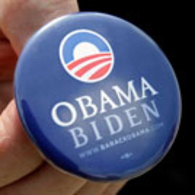 articles/2008/11/04/obamas-communications-director-on-diet-coke-punditsand-whats-next/cox-pfeiffer-obama-button_wr8jax