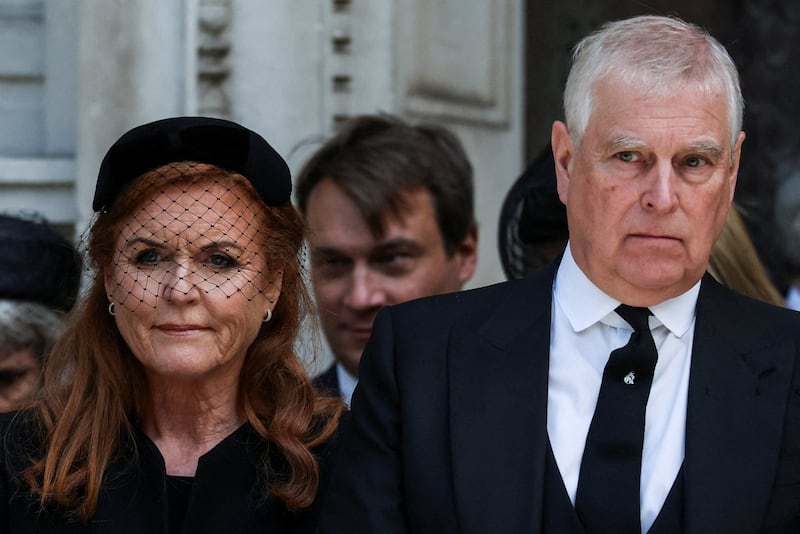 Britain's Prince Andrew and his former wife Sarah Ferguson, Duchess of York, leave Westminster Cathedral at the end of the Requiem Mass, on the day of the funeral of Britain's Katharine, Duchess of Kent, in London, Britain, September 16, 2025. REUTERS/Toby Melville/File Photo