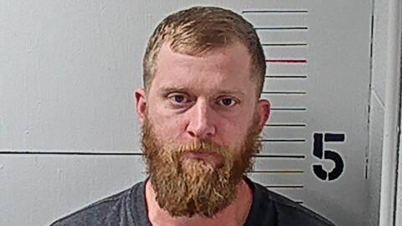 MURFREESBORO, TENNESSEE - MARCH 14: (EDITORS NOTE: Best quality available) In this handout photo provided by the Rutherford County Adult Detention Center, Kyle Chrisley is seen in a police booking photo at the Rutherford County Adult Detention Center after his arrest by the Smyrna, Tennessee Police Department on charges for aggravated assault on March 14, 2023 in Murfreesboro, Tennessee. Kyle Chrisley was released on a $3,000 bond.