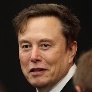 Tesla CEO Elon Musk attends the public memorial service for right-wing activist Charlie Kirk at State Farm Stadium in Glendale, Arizona, on September 21, 2025.