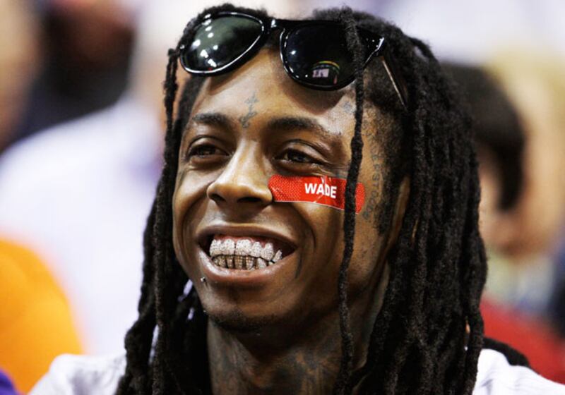 galleries/2009/11/13/stars-who-smoke-weed/smith-stoners---lil-wayne_av0ns6