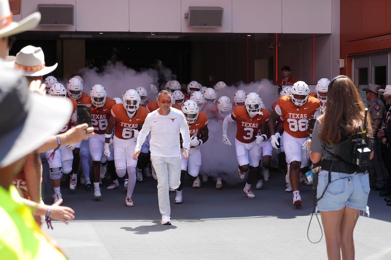 Sep 5, 2026; Austin, Texas, USA;  Texas Longhorns Head Coach Steve Sarkisian leads his team on to the field before a game against the Texas State Bobcats at Darrell K Royal-Texas Memorial Stadium.  Mandatory Credit: Scott Wachter-Imagn Images